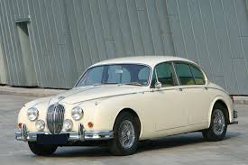 Image result for Old English White 1955 Jaguar