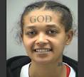 Woman tattoos 'God' on forehead