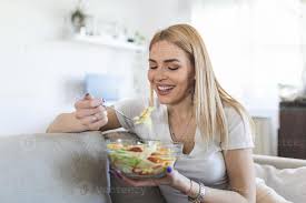 Image result for women eating salad and smiling