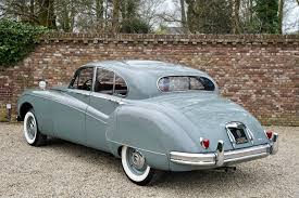 Image result for Silver Blue 1959 Jaguar