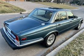 Image result for Poseidon Dark Green 1985 Jaguar