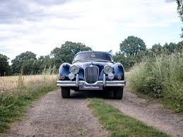 Image result for Silver Blue 1959 Jaguar