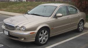 Image result for White Onyx 2002 Jaguar