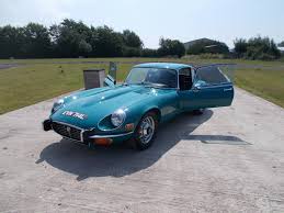 Image result for Turquoise 1973 Jaguar