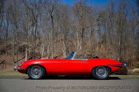 Image result for Maroon 1962 Jaguar