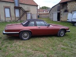 Image result for Sebring Red 1986 Jaguar