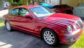 Image result for Carnival Red 1999 Jaguar