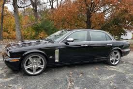 Image result for Black Cherry 2006 Jaguar
