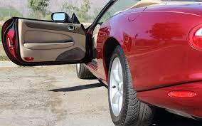 Image result for Carnival Red 1999 Jaguar