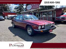 Image result for Grenadier Red 1987 Jaguar