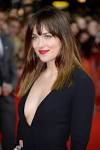 Dakota Johnson shows skin in plunging neckline dress - NY Daily News