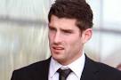 Rape football star Ched Evans set to play again - wearing an.