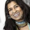 Stock Photo of Pretty Indian Woman Smiling Indian Woman Smiling - 0098-0512-1209-3727_pretty_indian_woman_smiling
