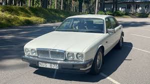 Image result for Glacier White 1988 Jaguar