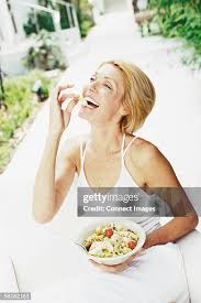 Image result for women eating salad and smiling