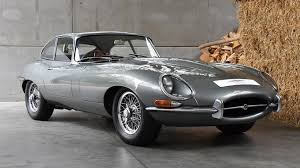 Image result for Maroon 1962 Jaguar