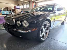 Image result for Black Cherry 2006 Jaguar