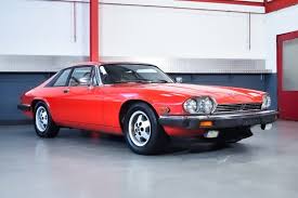 Image result for Sebring Red 1986 Jaguar