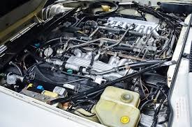 Image result for Glacier White 1989 Jaguar