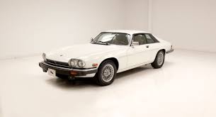 Image result for Glacier White 1989 Jaguar