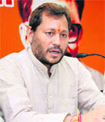 State BJP chief Teerath Singh Rawat addresses mediapersons in Dehradun on Wednesday. A Tribune photograph - dun2