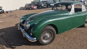 Image result for Dark Green 1959 Jaguar