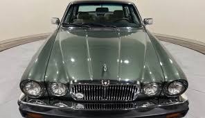 Image result for Poseidon Dark Green 1985 Jaguar
