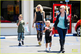 Image result for Queen B by Bumbleride $428 Gwen Stefani and Gavin Rossdale with Kingston and Zuma at the LA zoo