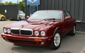 Image result for Burgundy 1983 Jaguar