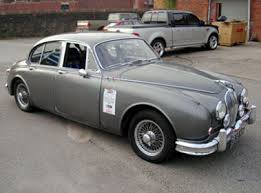 Image result for Silver Gray 1959 Jaguar