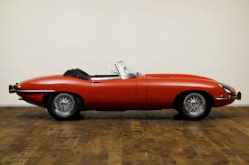 Image result for Carmen Red 1961 Jaguar