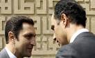 Alaa (R) and Gamal Mubarak (L)