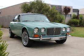 Image result for Turquoise 1973 Jaguar