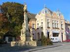 Szekszárd: The Town hall with the Holy Trinity Column from SE ...