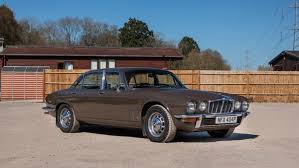 Image result for Carriage Brown 1977 Jaguar