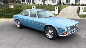 Image result for Turquoise 1973 Jaguar