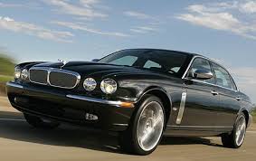 Image result for Black Cherry 2006 Jaguar