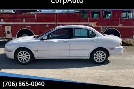 Image result for White Onyx 2002 Jaguar