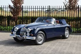 Image result for Silver Blue 1959 Jaguar