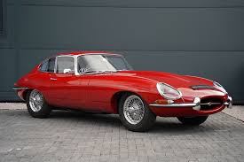 Image result for Maroon 1962 Jaguar