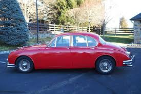 Image result for Carmen Red 1961 Jaguar