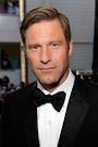 http://images.wikia.com/dcmovies/images/d/d4/AaronEckhart.jpg