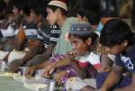 Rohingya Muslims: Boats with 1,600 migrants land in Malaysia and.