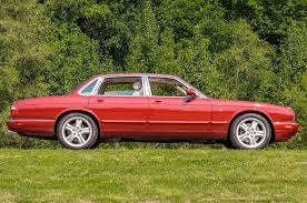 Image result for Carnival Red 1999 Jaguar