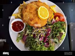 Image result for schnitzel mit pommes