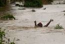 ISAAC DRENCHES HAITI, CUBA, HEADS TOWARD FLORIDA