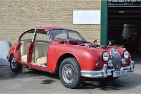 Image result for Maroon 1962 Jaguar