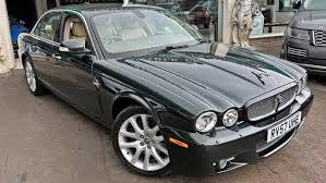 Image result for Maraschino Black 1981 Jaguar
