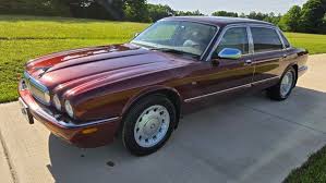 Image result for Phoenix Red 1999 Jaguar