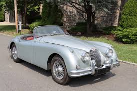Image result for Silver Blue 1959 Jaguar